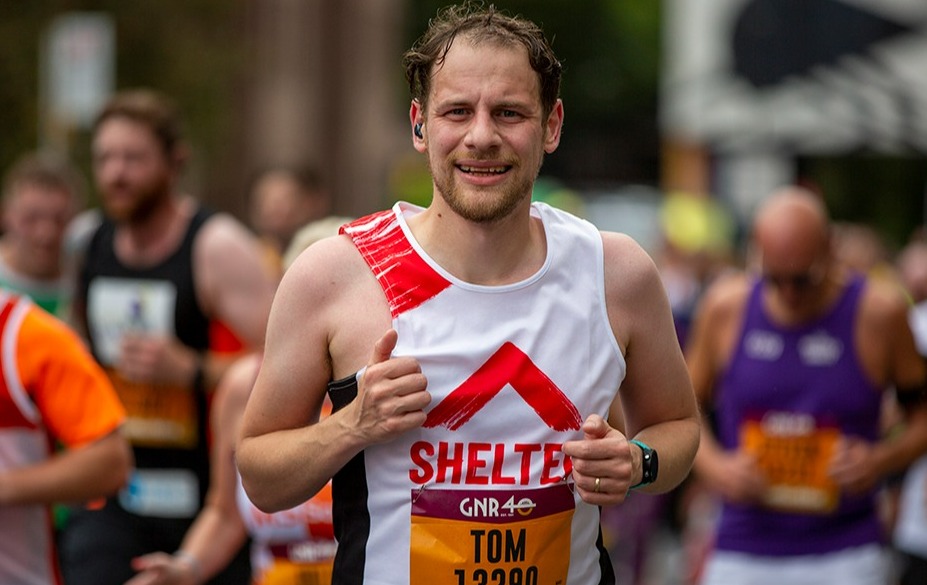 A runner wearing a Shelter vest, with a bib reading 'Great North Run'