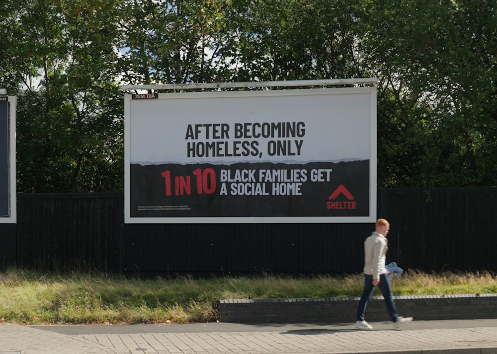 A billboard that reads: After becoming homeless, only 1 in 10 black families get a social home.