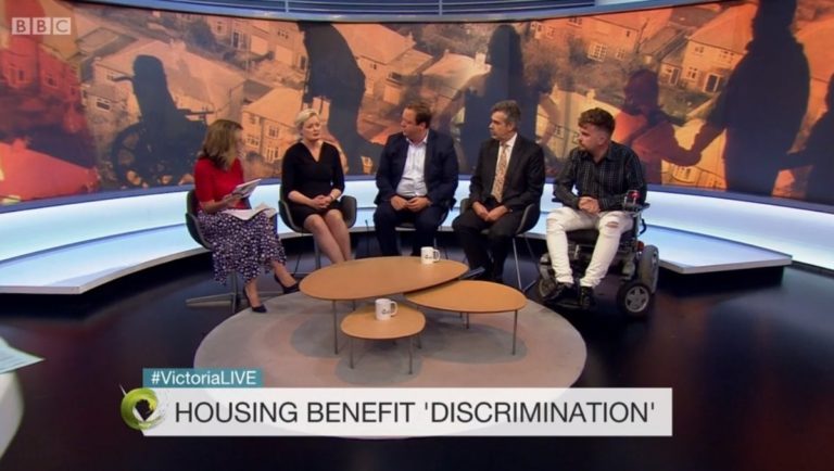 Panel sitting in a newsroom on the Victoria Derbyshire BBC show, to discuss housing benefit discrimination.