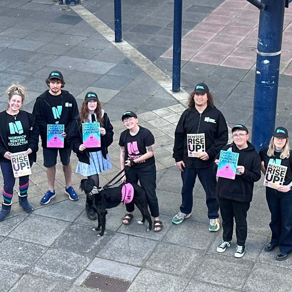 Campaigners holding signs and standing in Anglia Square, Norwich.
