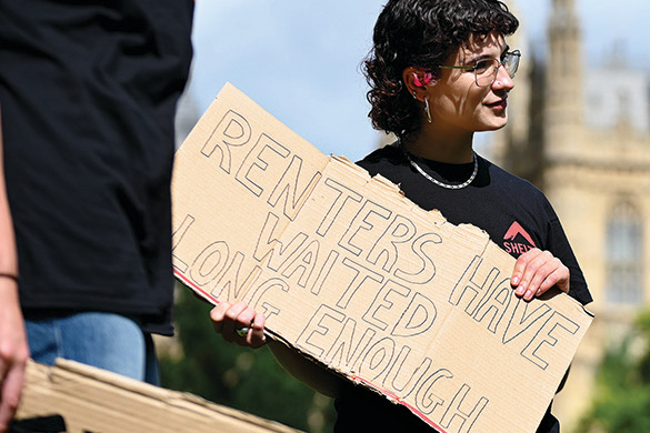 A Shelter campaign with a placard that says 'Renters have waited long enough'