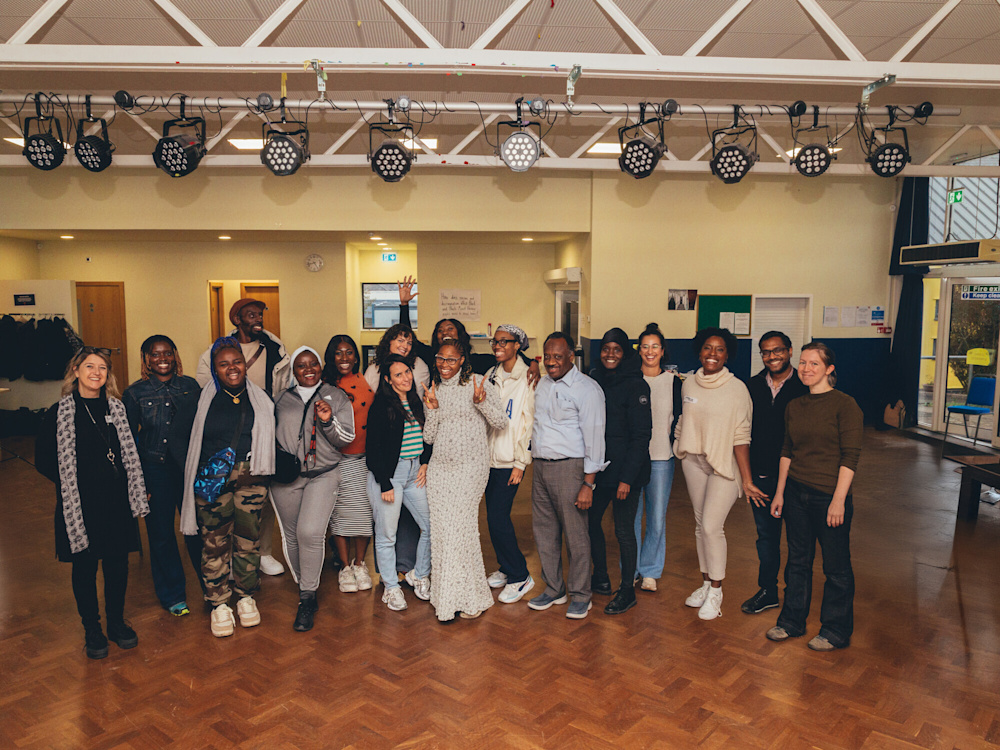 A group of Shelter supporters and researchers smiling