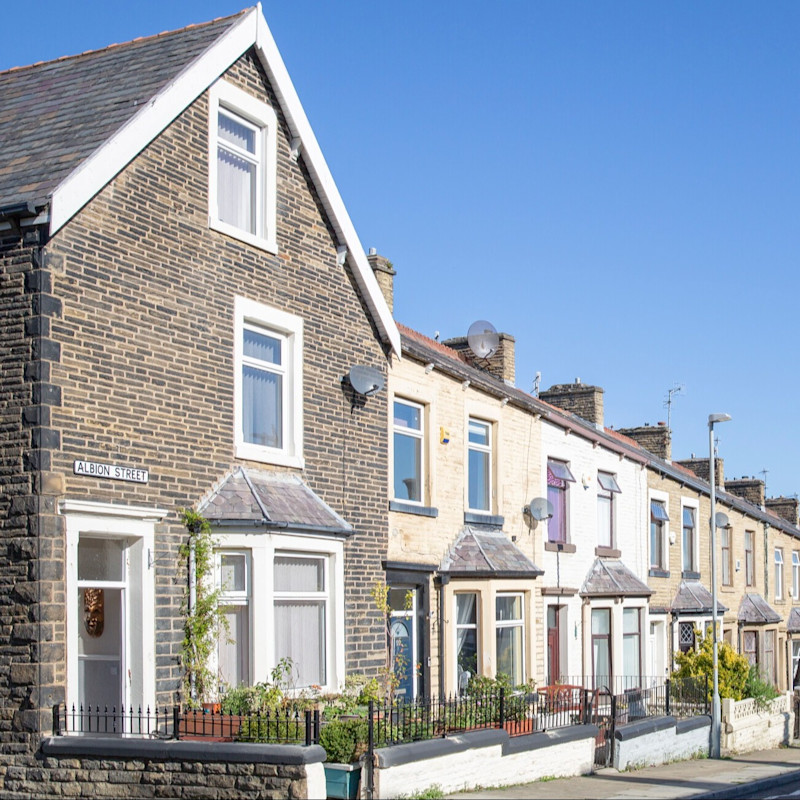 A row of terraced houses on a street in Burnley
