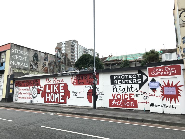 A full-length shot of the Bristol mural illustrating the impact of 'No DSS' discrimination.