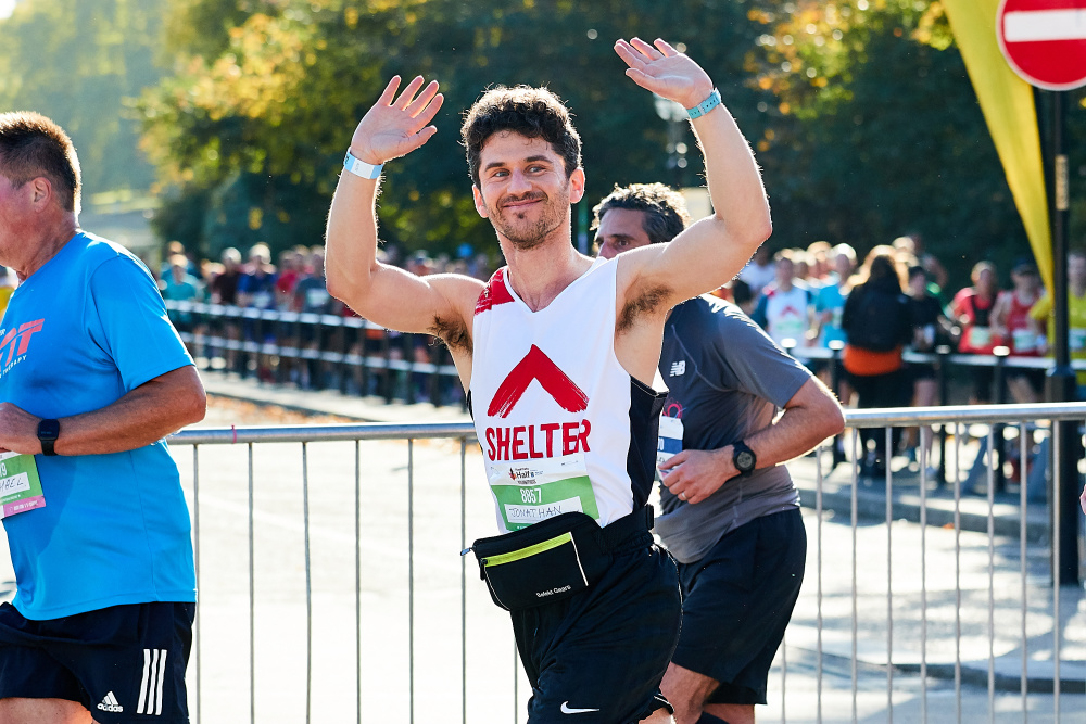 A marathon male runner at the Shelter Royal Parks Half Marathon 2022 