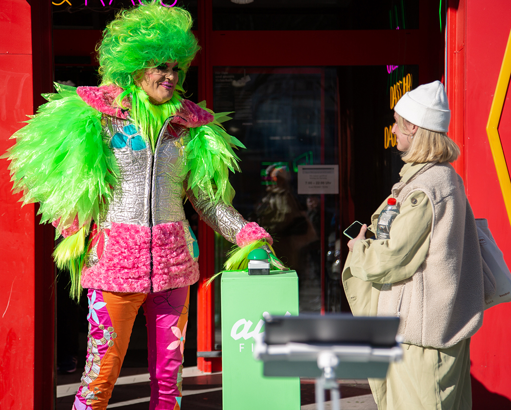 Olivia Jones at the buzzer for aidFIVE - the first purely digital social lottery - on the Reeperbahn in Hamburg