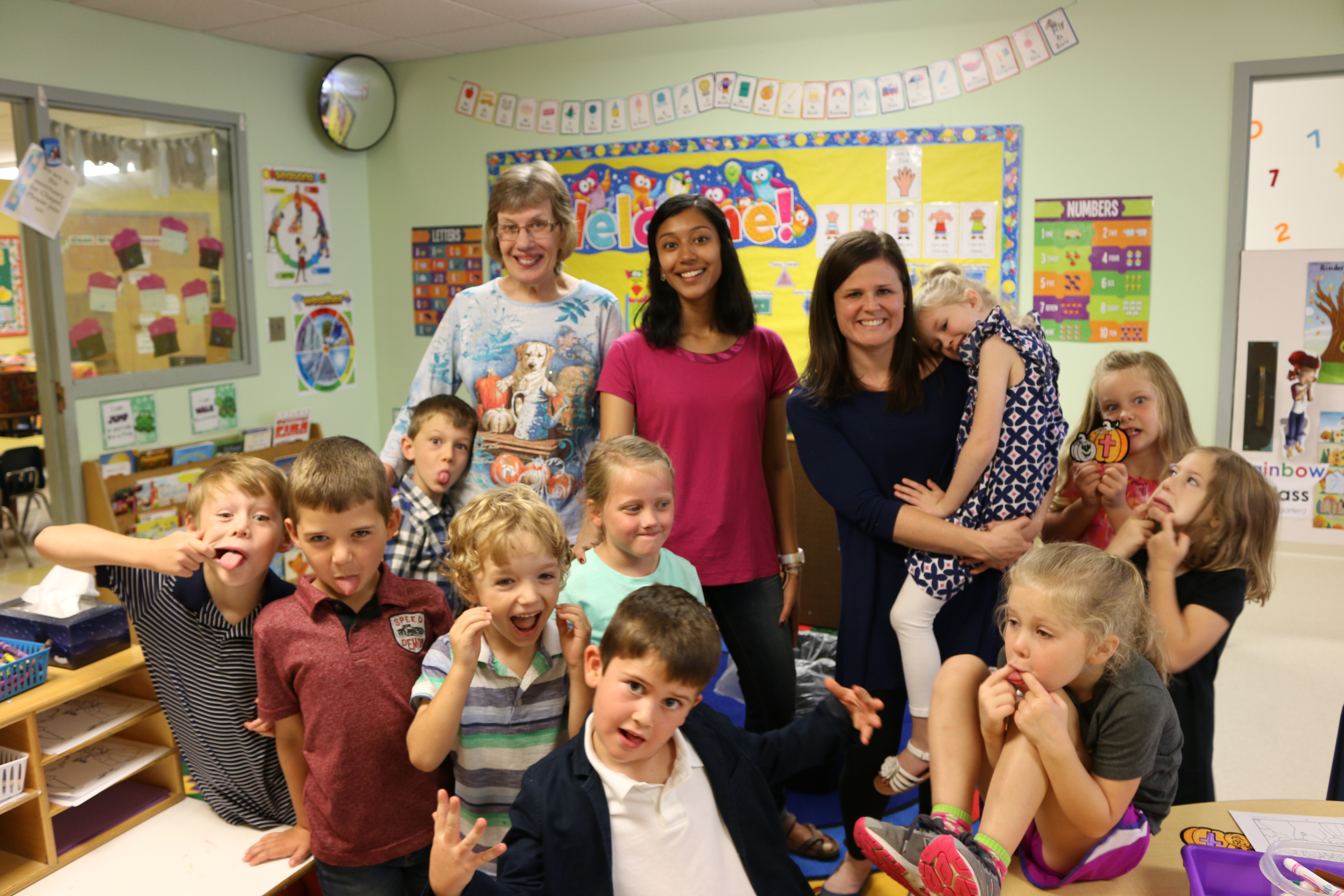 young kids and teachers in a classroom
