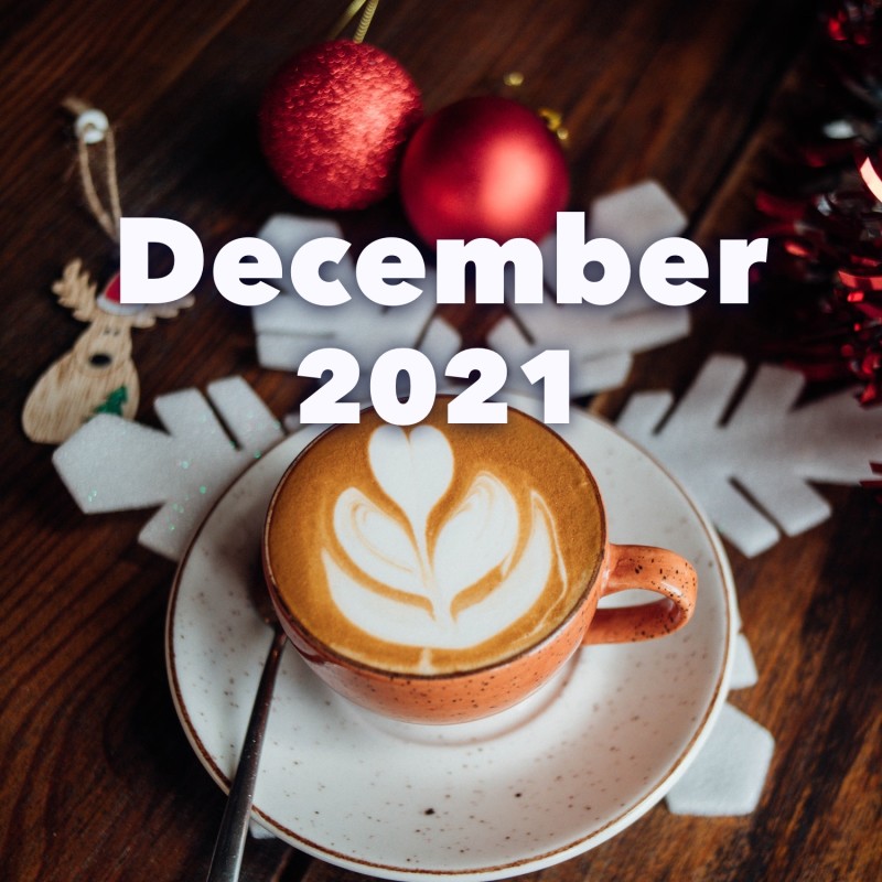 December 2021 text over photo of latte and paper snowflake