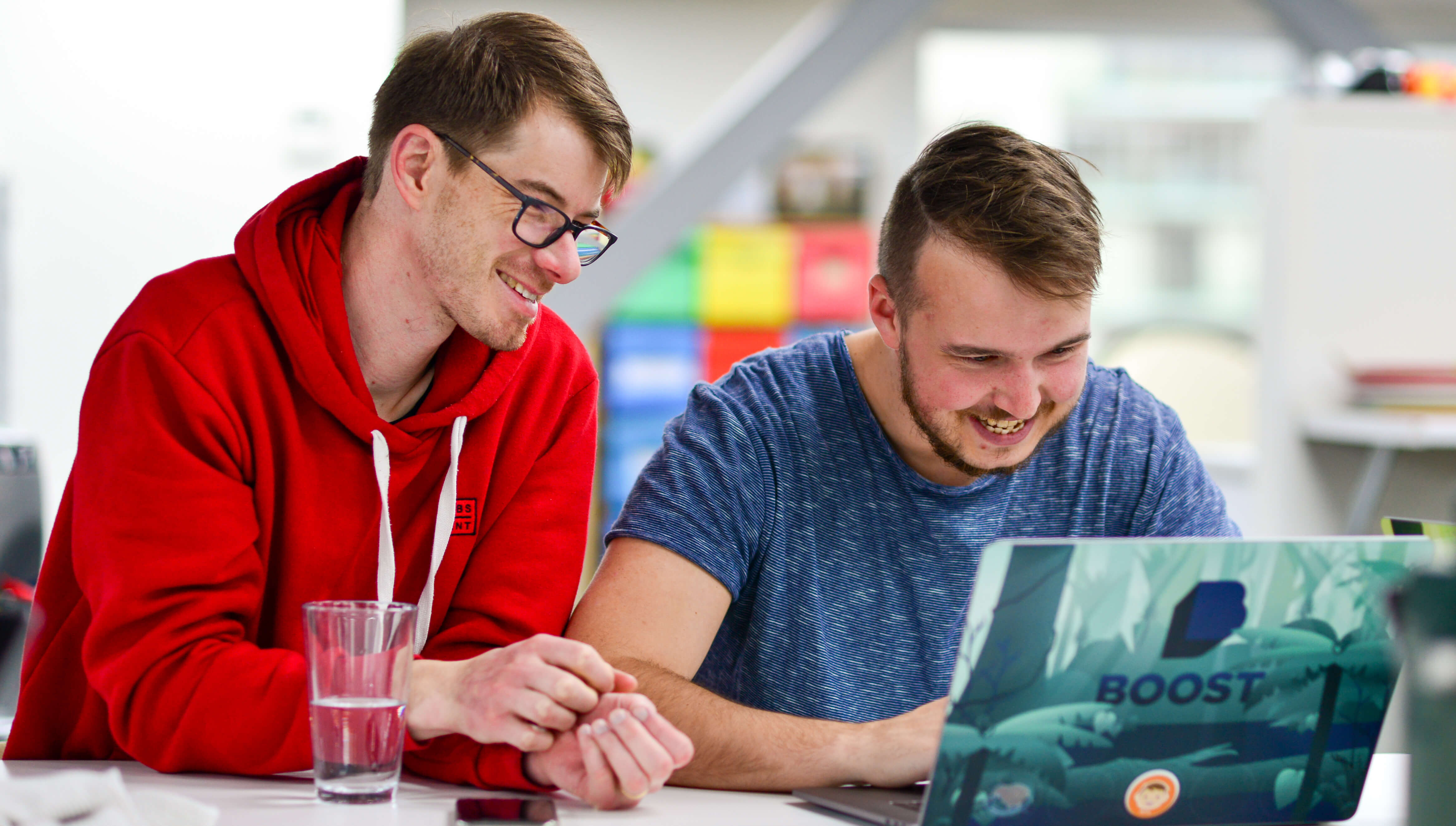 Boosters collaborating on FinCap's Client Voices web application.