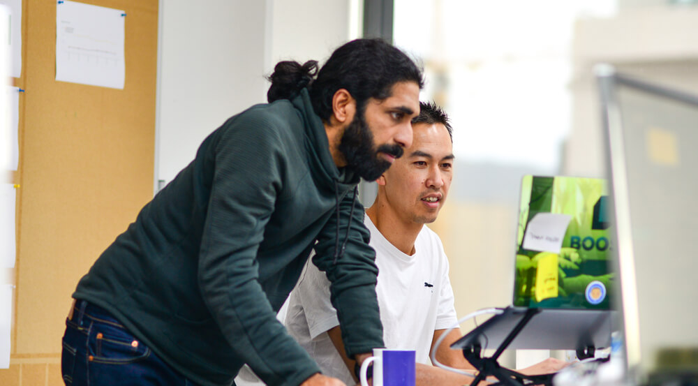 Two developers working on a Supplejack digital collection aggregation project