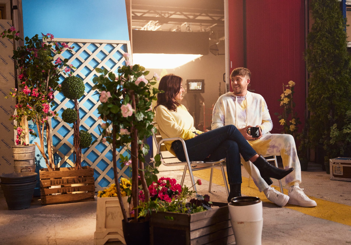 Campaign image for Benenden Health time for a check in campaign - Davina McCall and Roman Kemp sitting in a room chatting