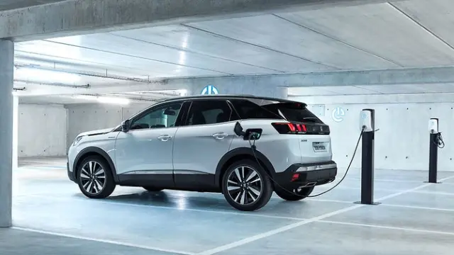The side exterior of a white Peugeot 3008