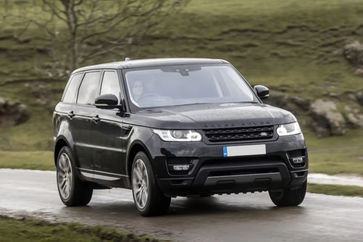 The front exterior of a black Land Rover Range Rover Sport