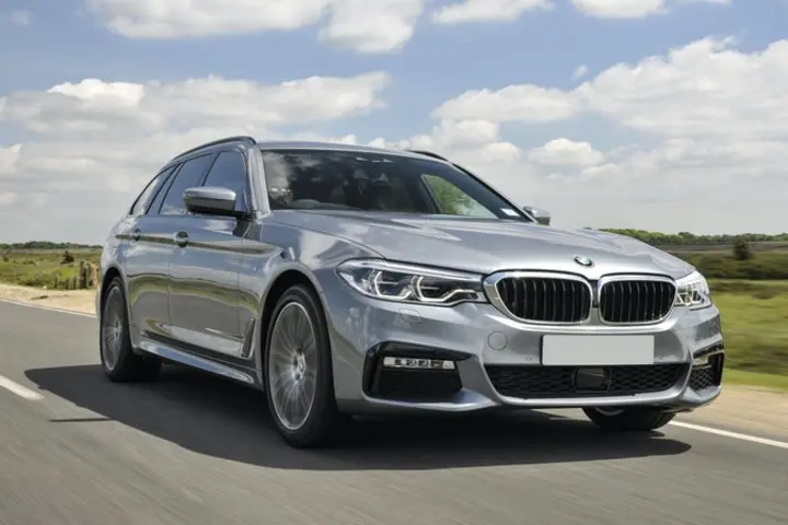 The exterior of a silver BMW 5 Series