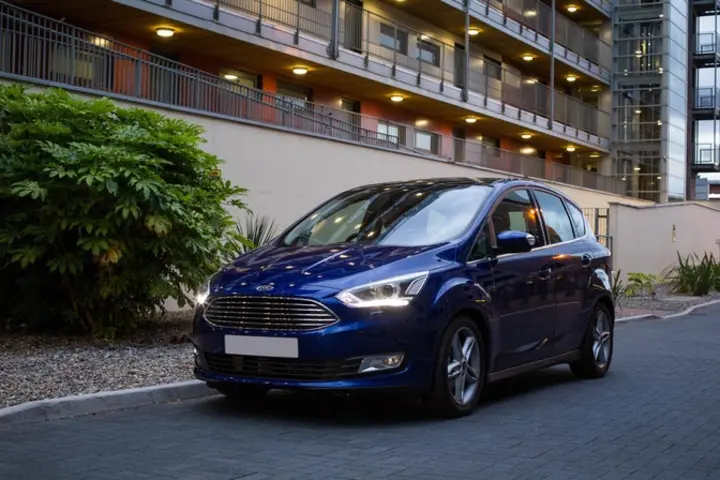 The front exterior of a blue Ford C-Max