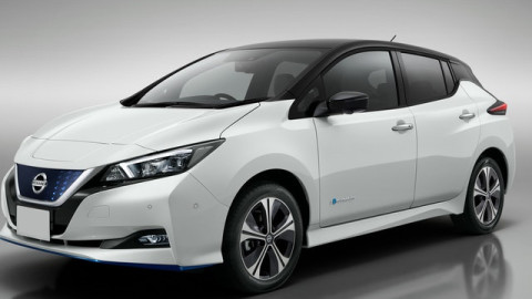 The front exterior of a white Nissan Leaf