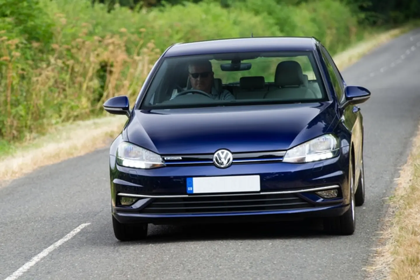 The exterior of a blue Volkswagen Golf