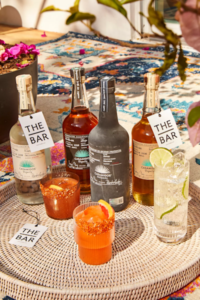 Casamigos Cuatro tequila and mezcal set with drink