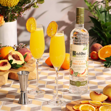 Ketel One Peach Mimosa Bottle And Cocktail