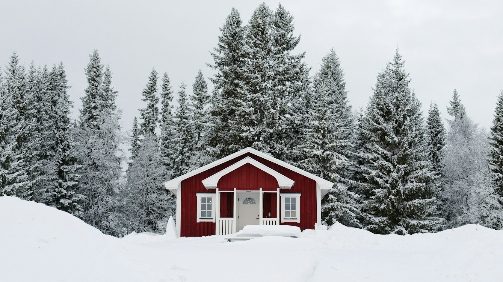 Sweden-winter-red-cabin-snow-marc-pell-Z7y4d3rAEj0-unsplash