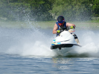 A Man Riding a Personal Watercraft