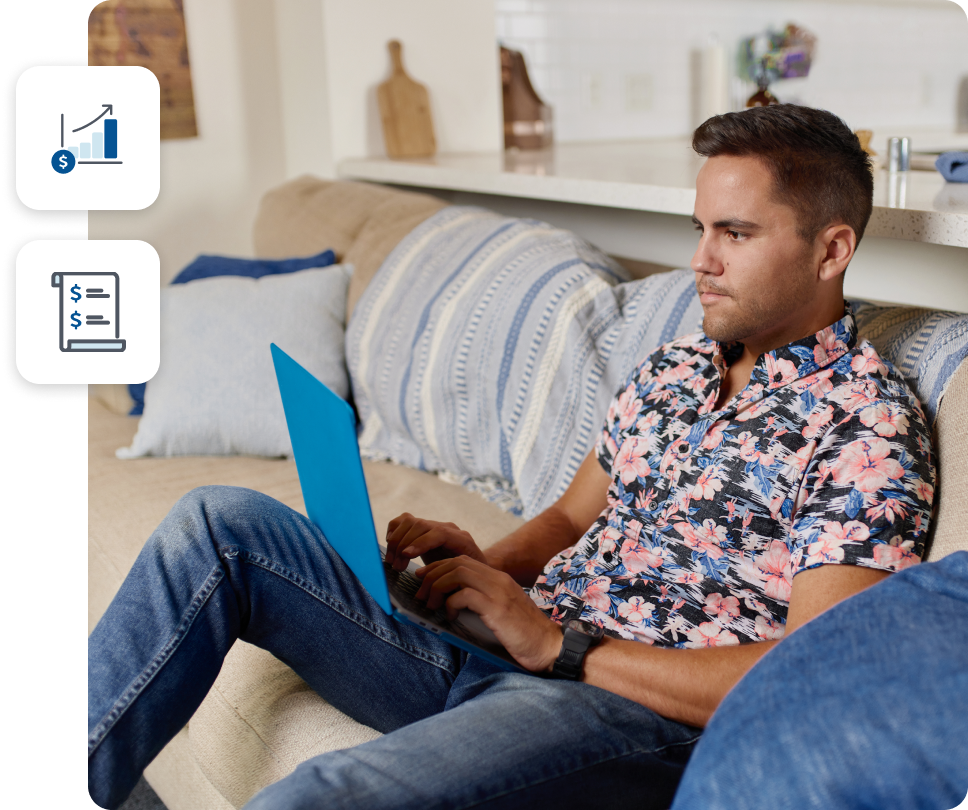 An investor working on his laptop in his home.