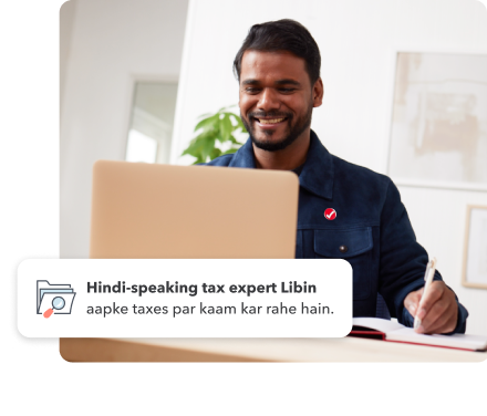 Libin, a tax expert, is working on his laptop. Secondary image of a files icon with the text “Tax expert, Libin is working on your taxes.