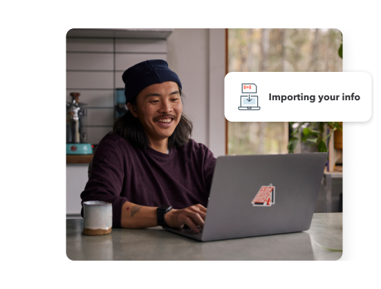 A young man smiling while working on his laptop in his home setting. Secondary illustration with “Importing your info” text and laptop icon.