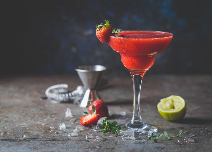 Strawberry Daiquiri garnished with strawberry and lime