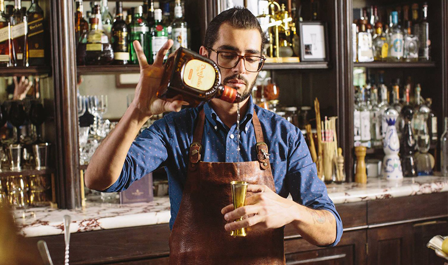 Bartender shaking a shaker