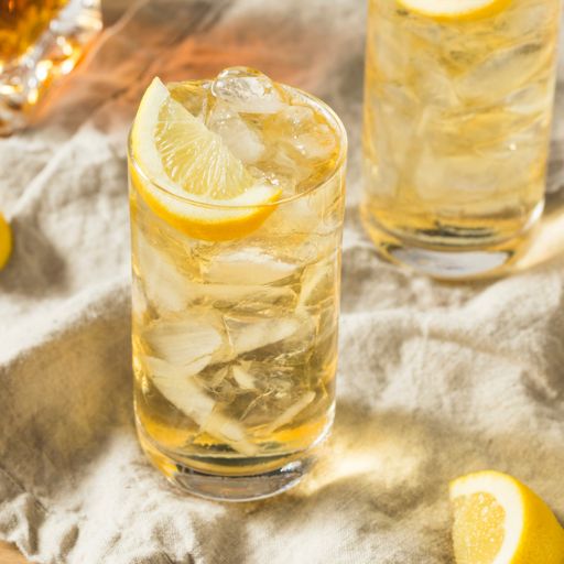 Johnnie Walker highball cocktail with lemon garnish and ice 