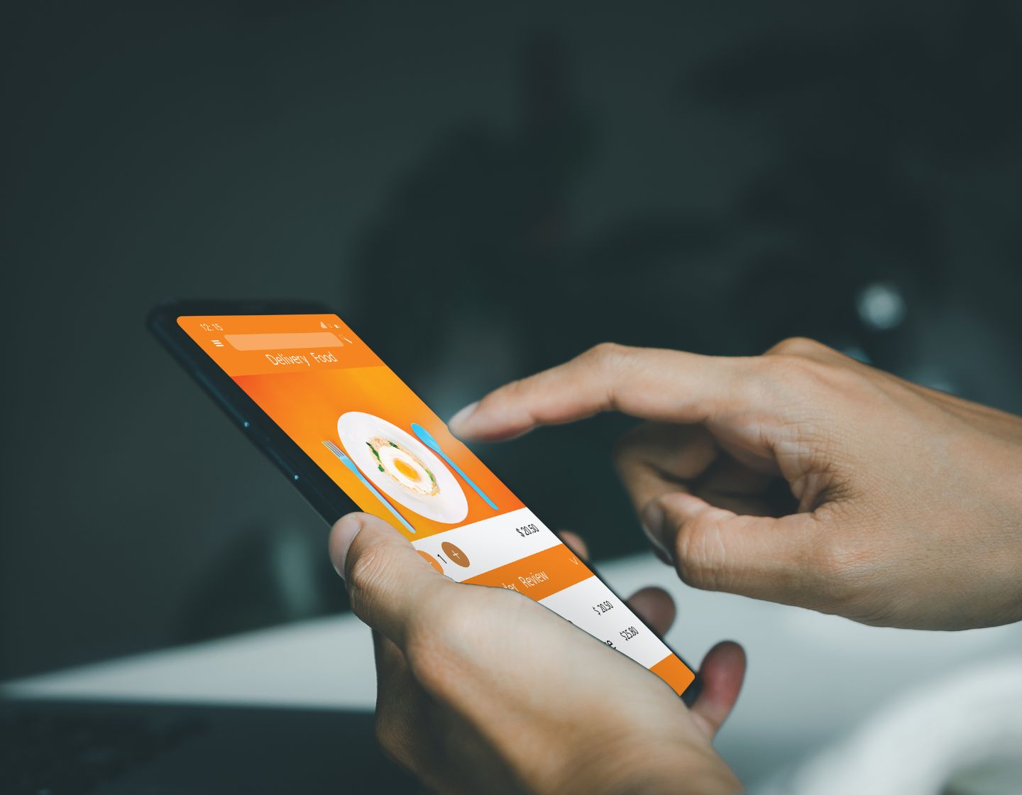 Hand holding phone with online menu 