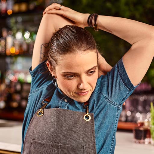  A bartender stretching