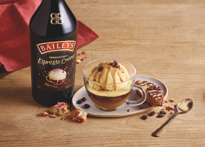 A glass cup of affogato and Baileys Espresso Creme