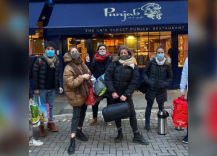 A group of people standing outside together