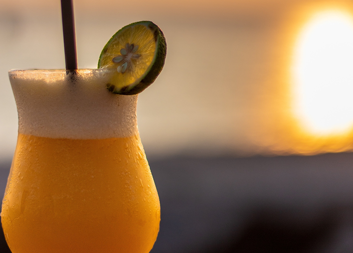 Frozen cocktail with lime garnish