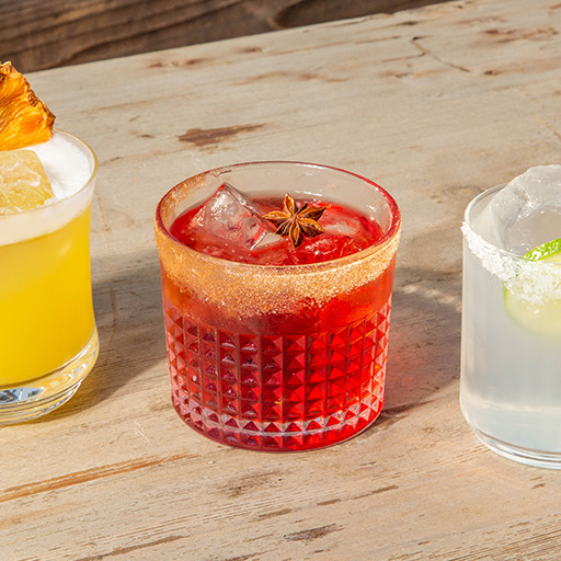 Cocktails on a wood plank