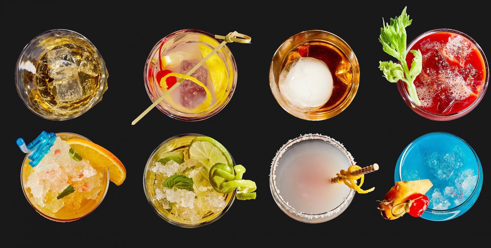Cocktail assortment and ingredients displayed on table 