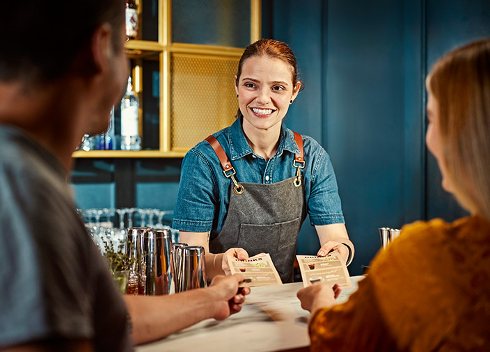 guest smiling at the server