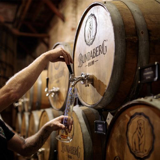 Bundaberg rum being poured from a cask.