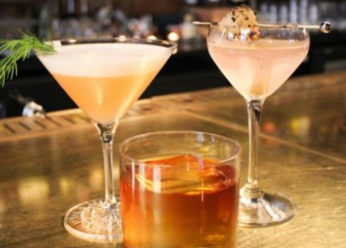 Trio of different cocktails with garnishes