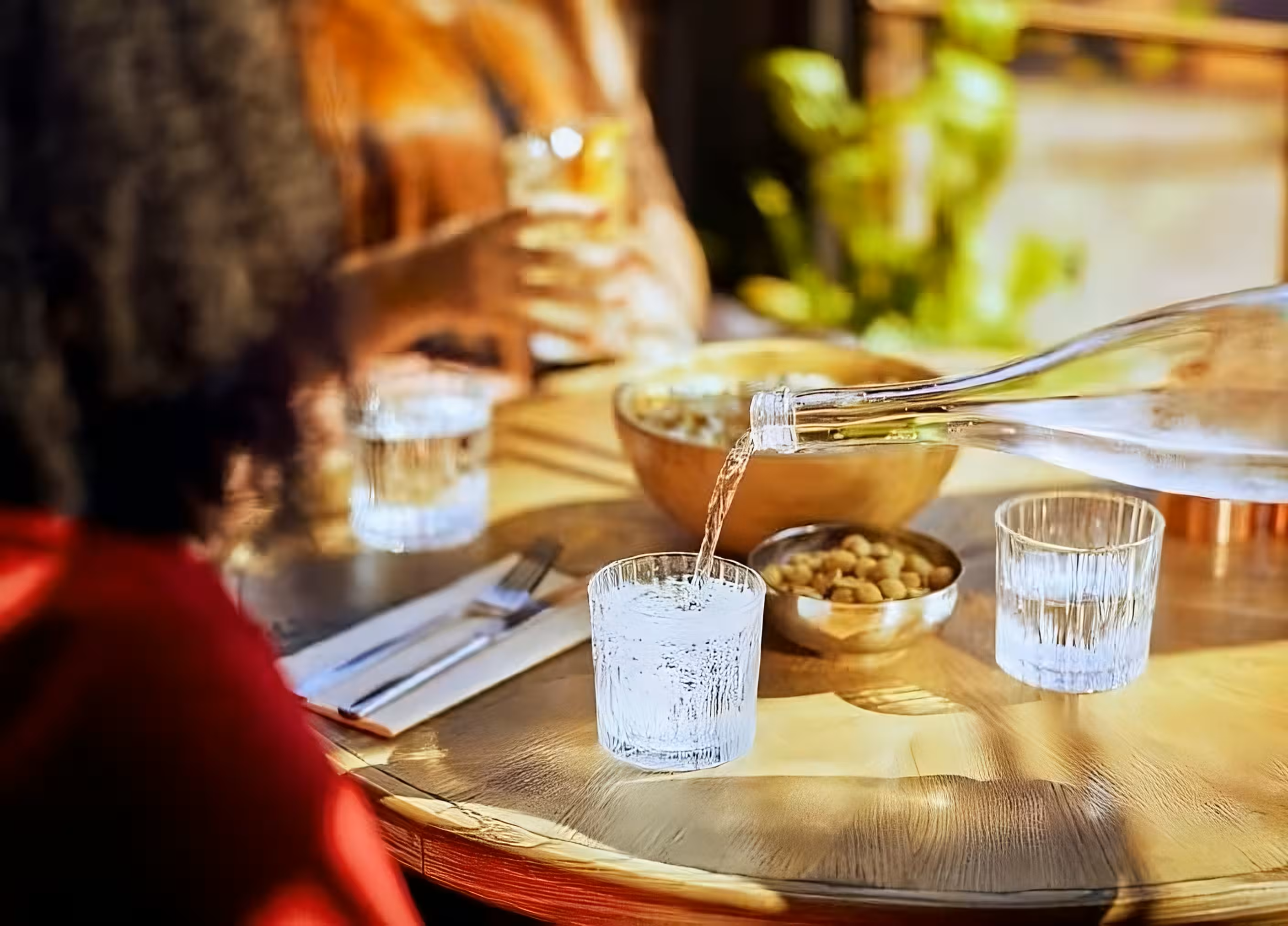 Pouring water in a glass