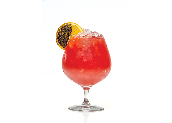 Cocktail with burnt orange garnish