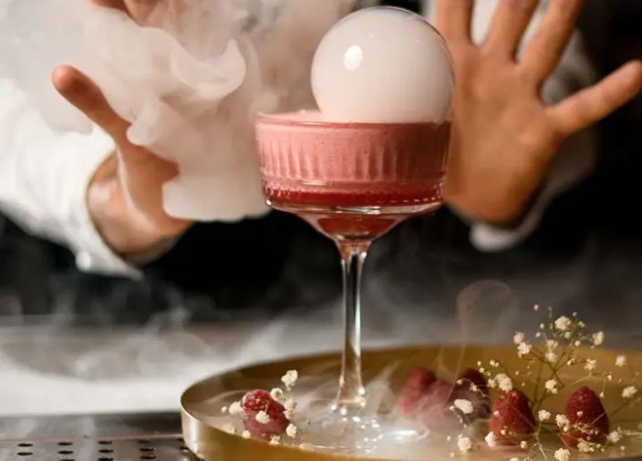 Bartender with a dry ice cocktail