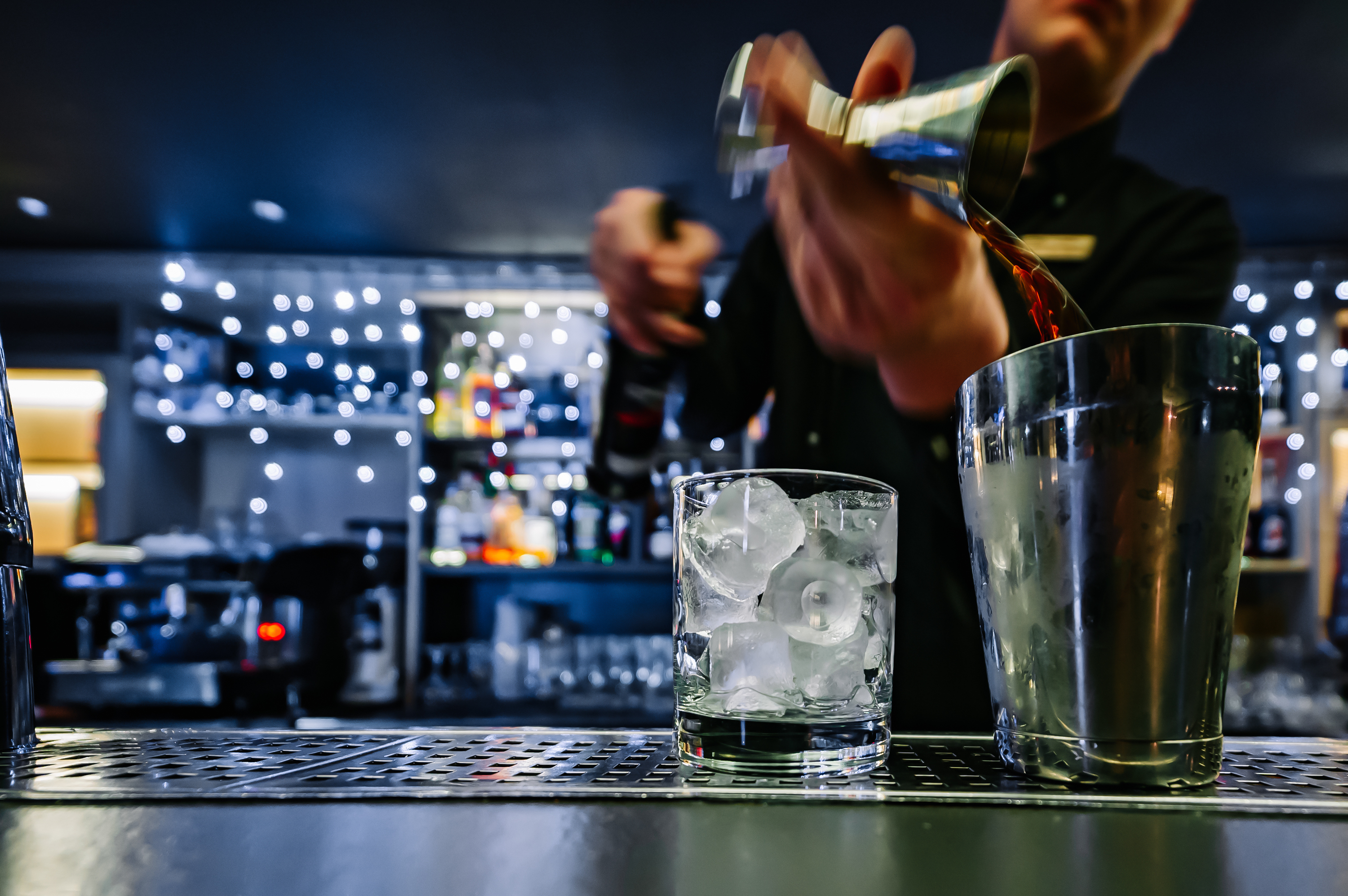 Bartender making cocktails