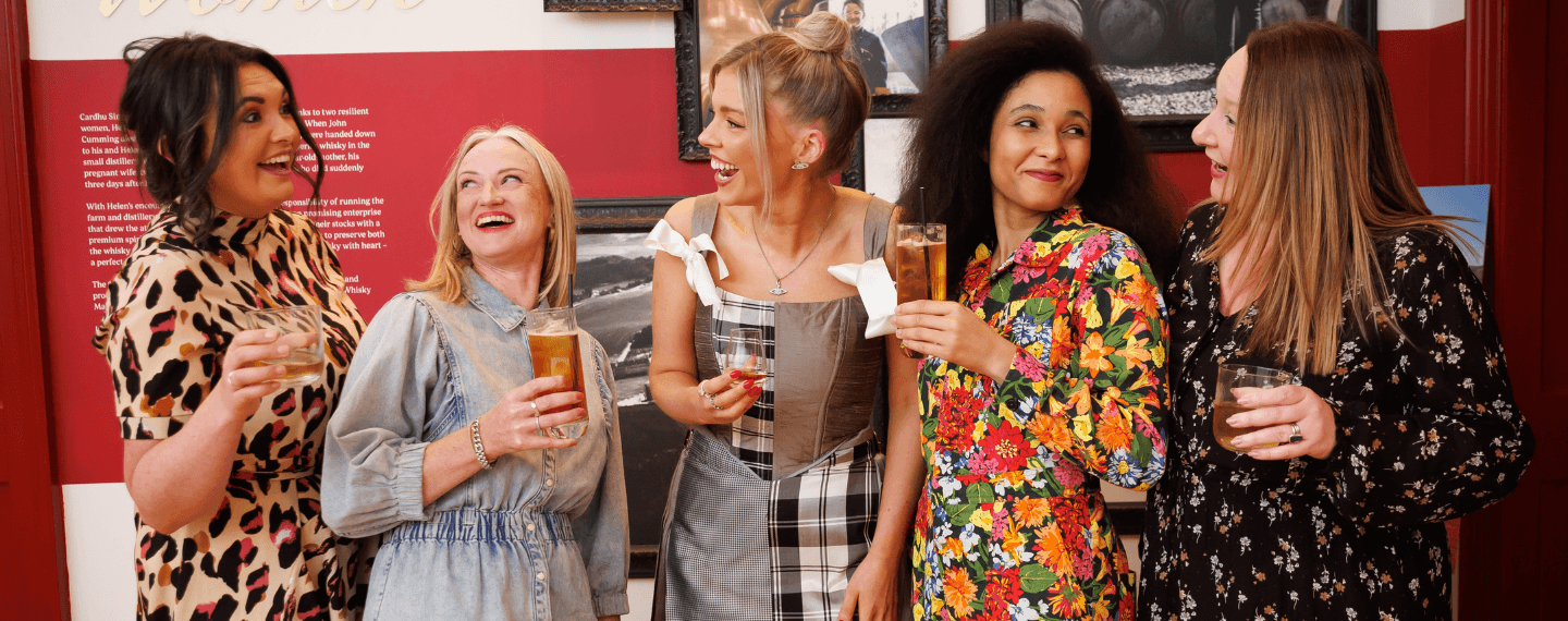 Women sharing cocktails