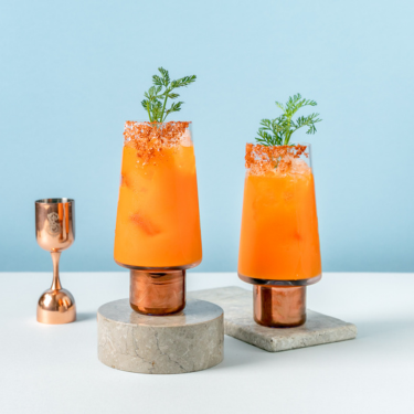 two orange Seedlip cocktails