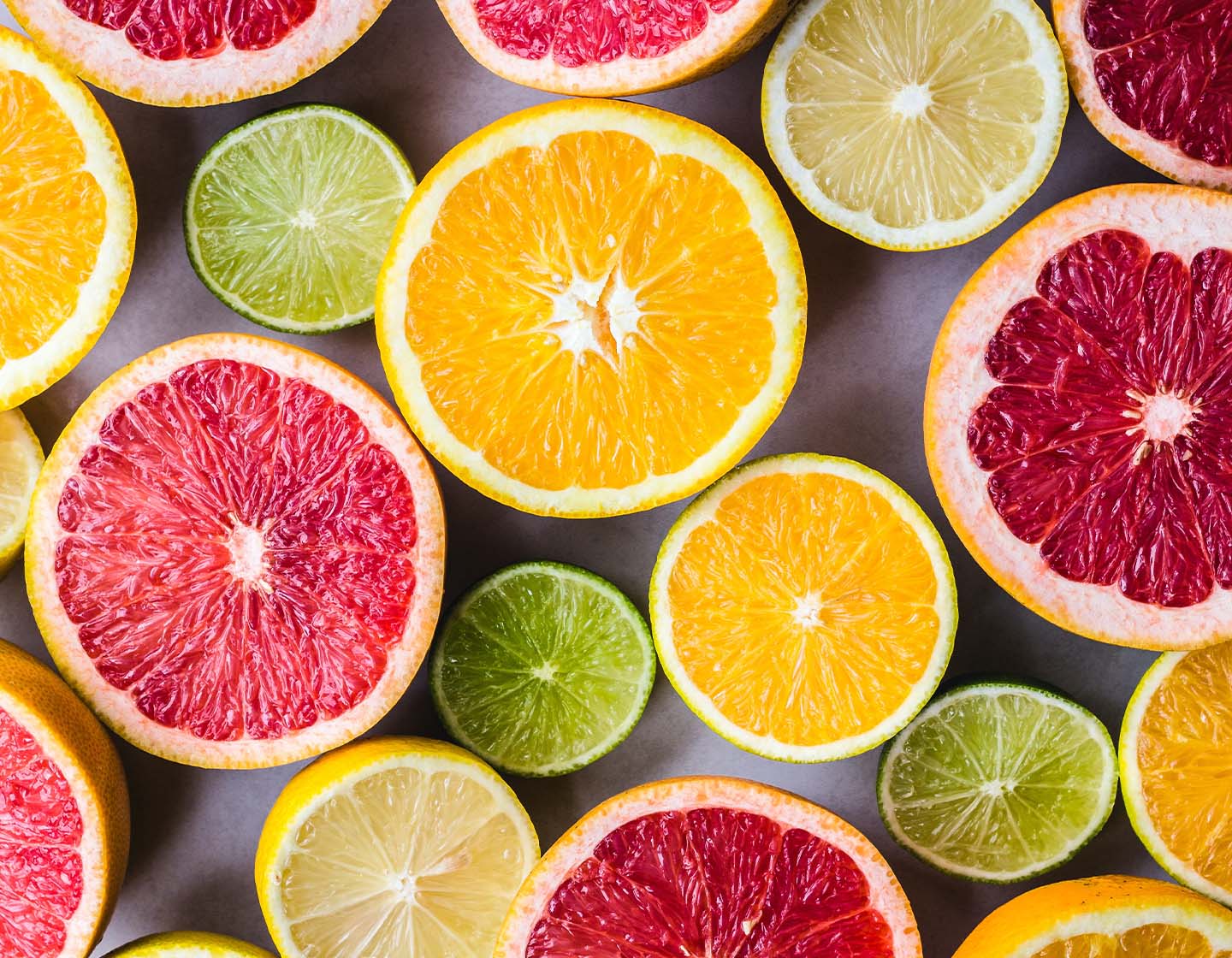 Variety of citrus slices in different colours