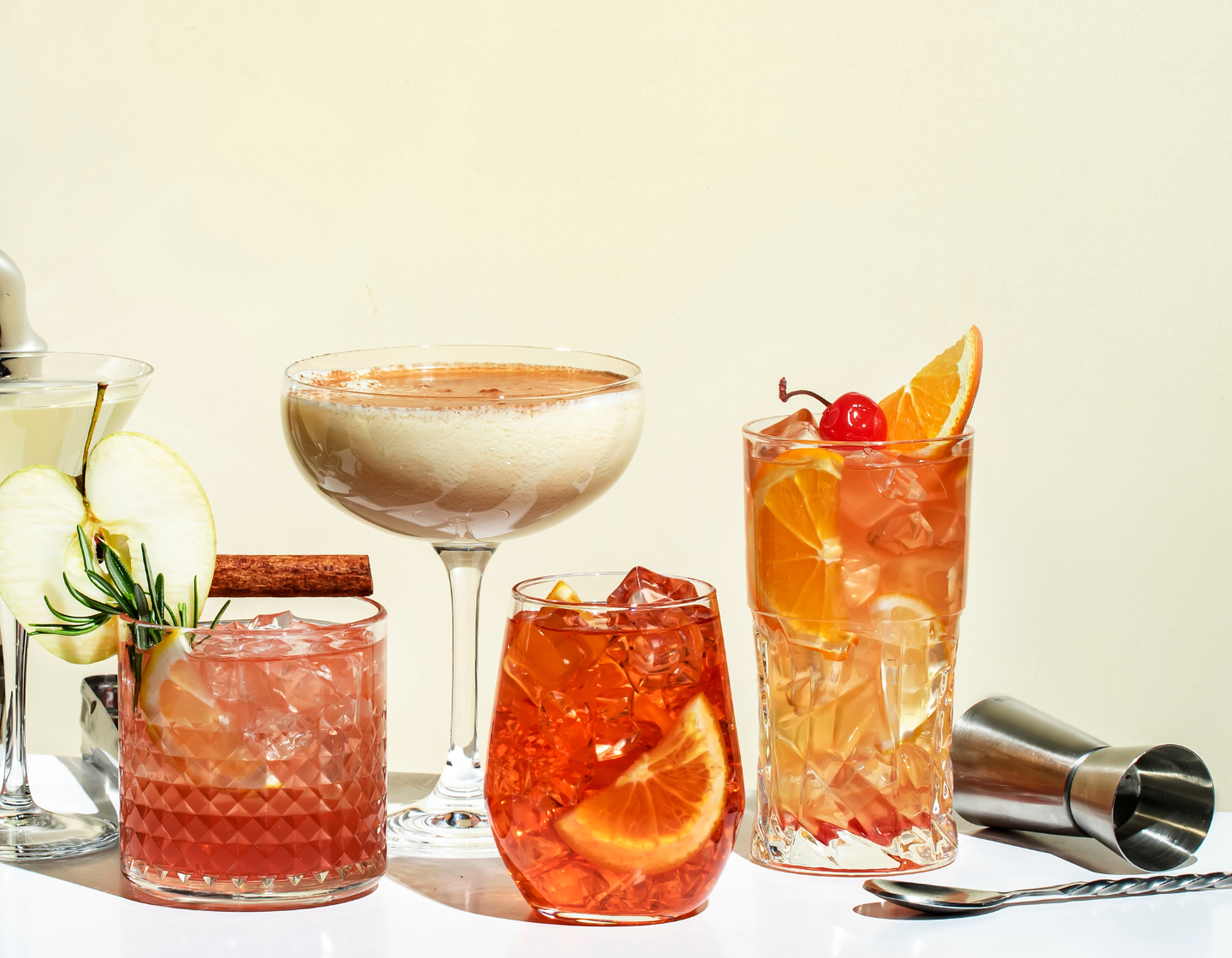 Whisky cocktails with a measure and stirrer,