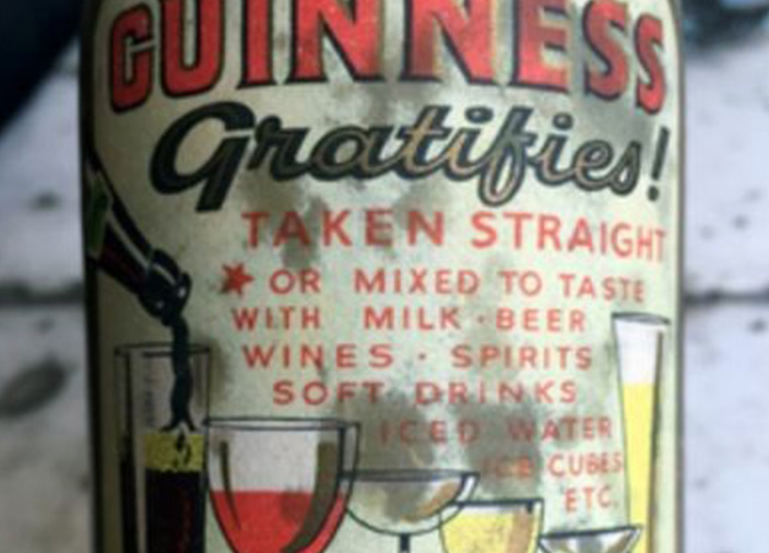 A close-up of a label of vintage Guinness beer